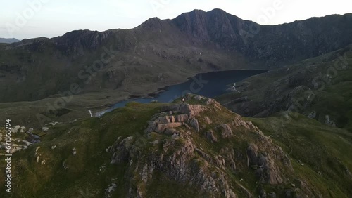 Aerial of Llyn Llydaw Mount Snowdon Wales with hikers on mountain top photo