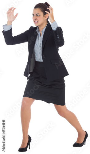 Digital png photo of angry biracial businesswoman with hands in air on transparent background