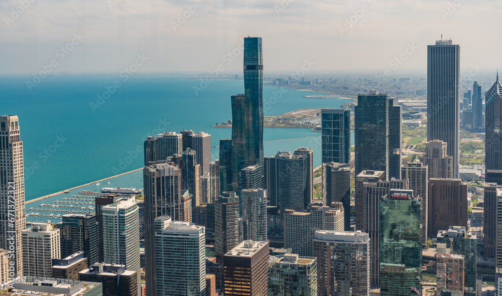 Obraz premium skyscraper architecture of chicago seaside city. metropolis city skyline. aerial view on downtown cityscape. skyscraper aerial view. cityscape skyline. architectural building in touristic metropolis