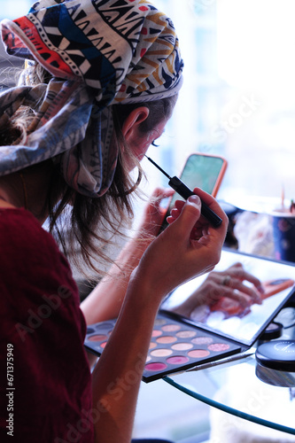 Woman doing makeup tutorial