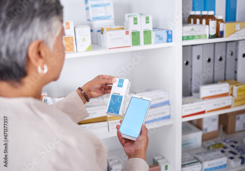 Woman, hands and phone mockup at pharmacy for medication, research or information on product in store. Female person looking at medicine with smartphone display for pharmaceutical search at clinic