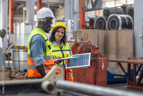 Factory metal workers install solar panels, cut costs, earn carbon credits, combat climate change.