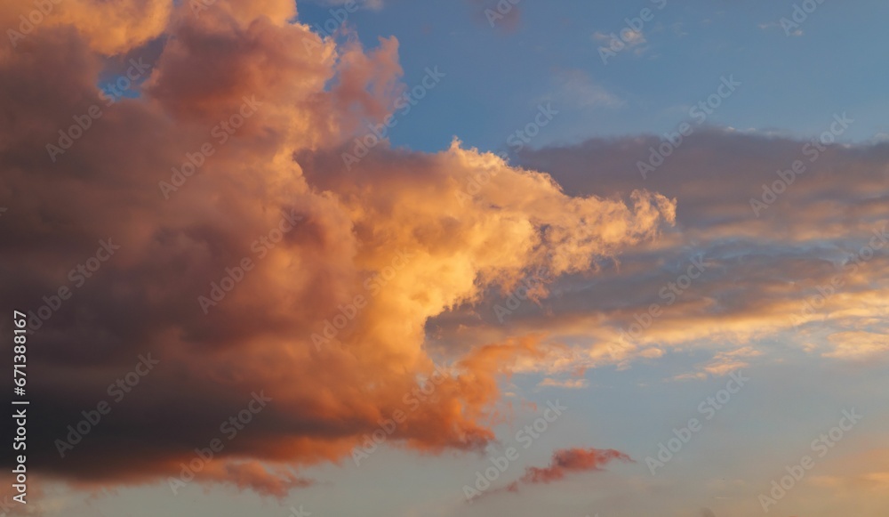 Scenic view of golden clouds at sunset