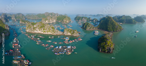 Floating fishing village in Lan Ha Bay, Vietnam viewed from above. Famous tourist destination in the north of Vietnam
