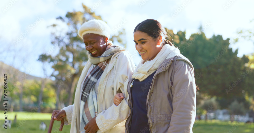 Senior care, old woman with cane and nurse in park with support, help or trust at nursing home. Retirement healthcare, elderly person and happy caregiver walk and talk in garden together with smile.