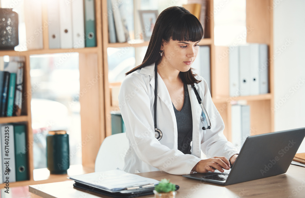Doctor, laptop and woman typing in hospital for research, online consultation or telehealth. Technology clinic, computer and female physician writing medical report, healthcare email or wellness app. Doctor, laptop and woman typing in hospital for research, online consultation or telehealth. Technology clinic, computer and female physician writing medical report, healthcare email or wellness app.