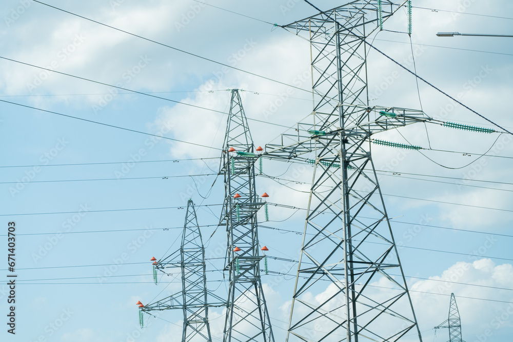 High voltage towers with sky background. Power line support with wires ...