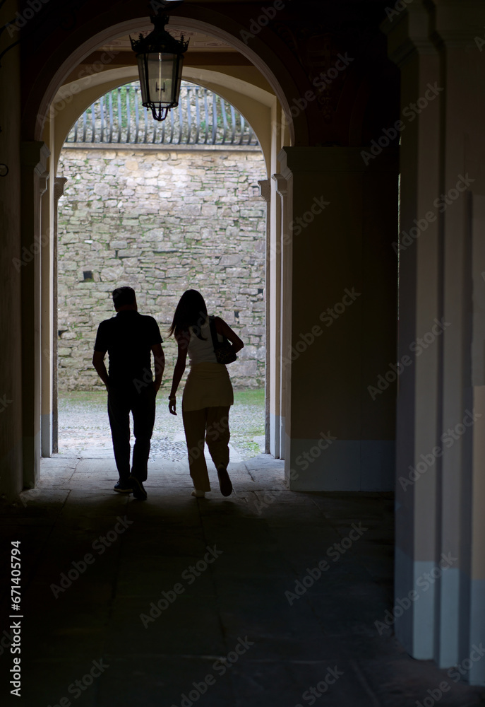 Bergamo, one of the beautiful city in Italy. Two friends, a couple are walking through the ancient streets of the Italian city of Bergamo