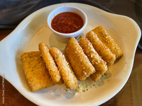 Fried mozzarella cheese with marinara sauce for dipping.