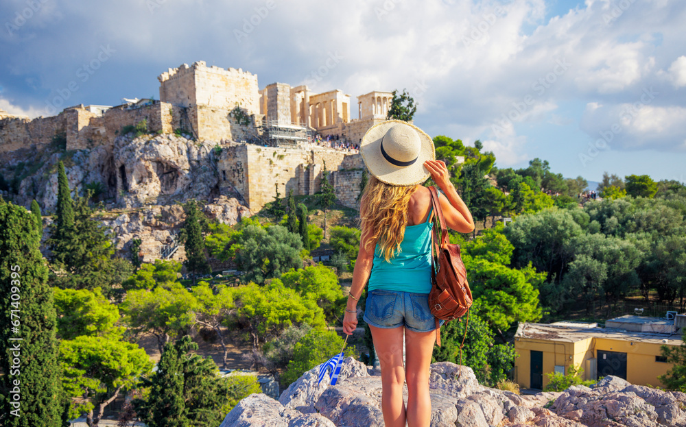 Fototapeta premium Woman tourist looking at Acropolis in Athens city- Greece