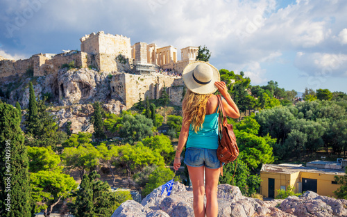 Woman tourist looking at Acropolis in Athens city- Greece photo