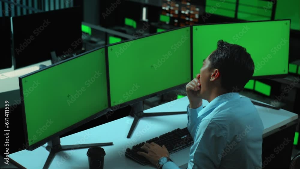 Side View Of Tired Asian Man Yawning Before Sleeping While Working With Mock Up Multiple Computer Monitor In The Office
Side View Of Tired Asian Man Yawning Before Sleeping While Working With Mock Up Multiple Computer Monitor In The Office
