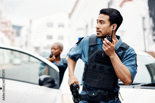 Εκτύπωση καμβά Police, emergency and officer with gun calling backup for an investigation or law protection in city or urban town