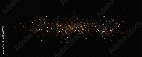Golden sequins glow with many lights. Glittering dust. Luxurious background of golden particles.