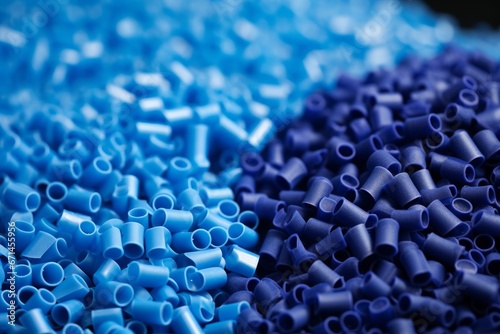 Close up of a two stacks of blue plastic polypropylene granules on a table  Generative AI