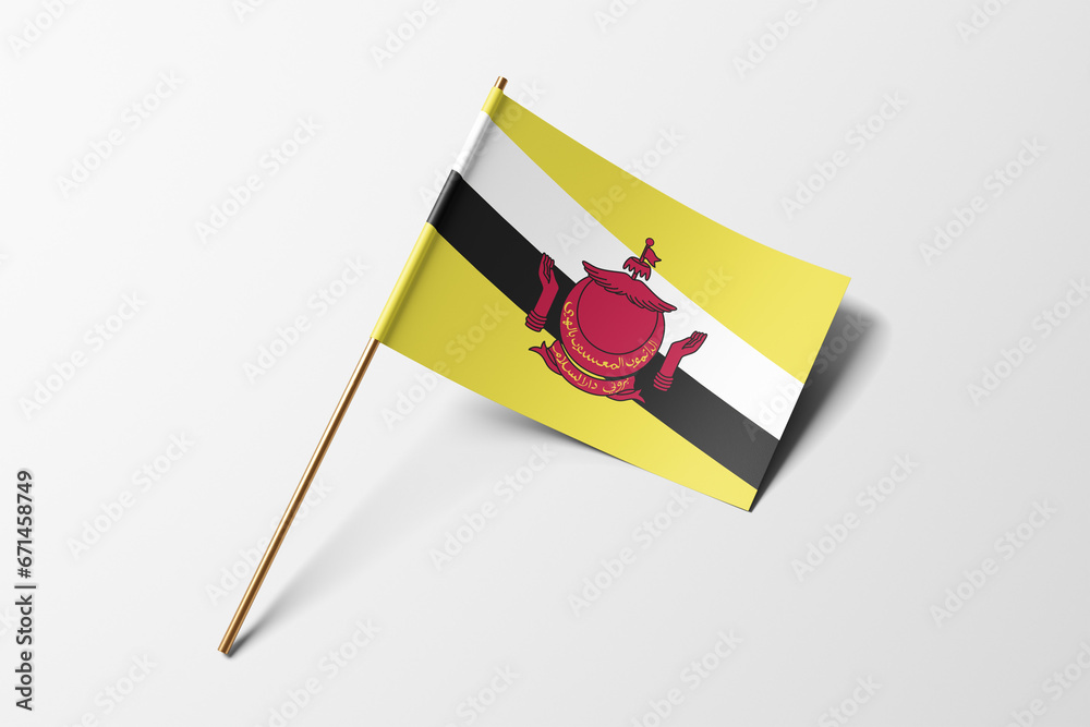 Brunei flag of small paper, isolated on white background Brunei flag of small paper, isolated on white background