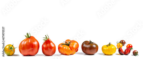 Panoramic Panning of heirloom tomatoes on black background photo