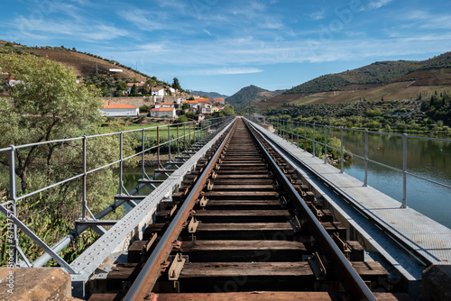 Ponte metálica com a linha de ferro na foz do rio Douro com o rio Tua em Trás os Montes, Portugal photo