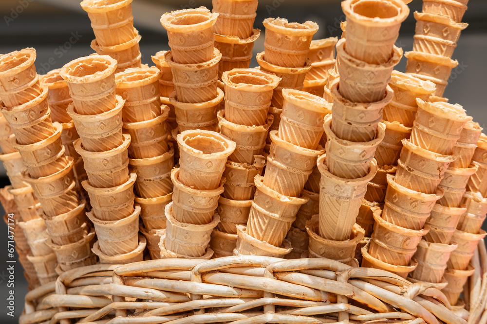 Obraz premium Collection of empty ice cream cone. Empty ice cream cones in a backet.