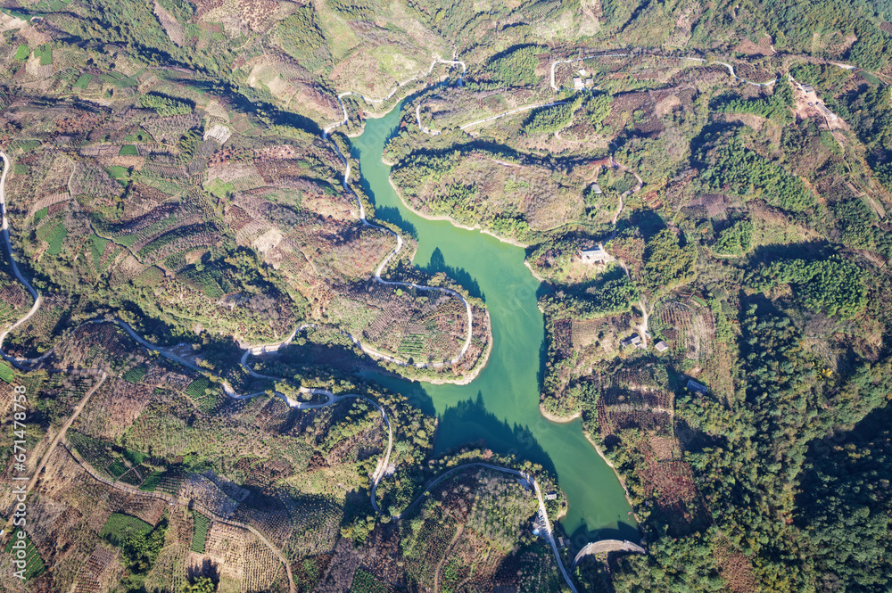 Drone view of reservoir and dam, high angle view of beautiful green water and hills at Ningbo, Zhejiang province, China.