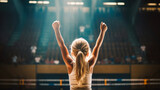Blonde junior gymnast celebrates victory alone under spotlight.