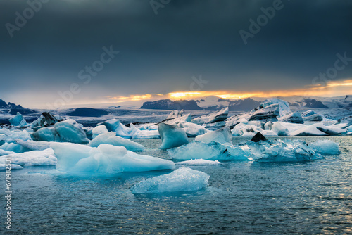 Jokulsarlon glacier lagoon with blue iceberg melting during summer in the evening at Vatnajokull national park  Iceland