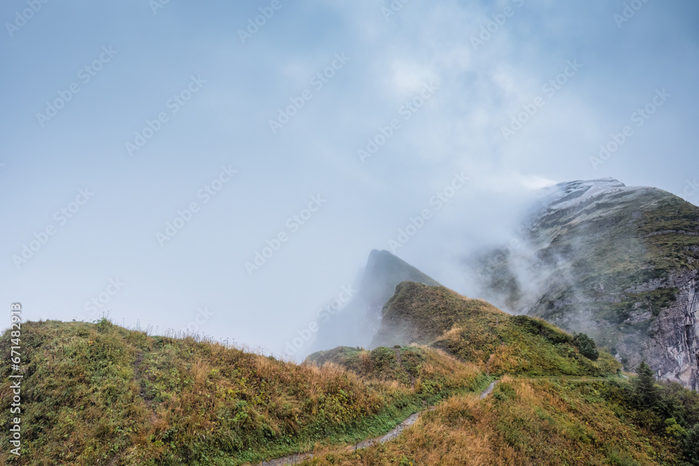 Foggy mountain ridge of Saxer Lucke viewpoint in the morning at Appenzell, Switzerland