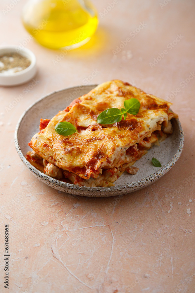 Traditional homemade lasagna with fresh basil Traditional homemade lasagna with fresh basil
