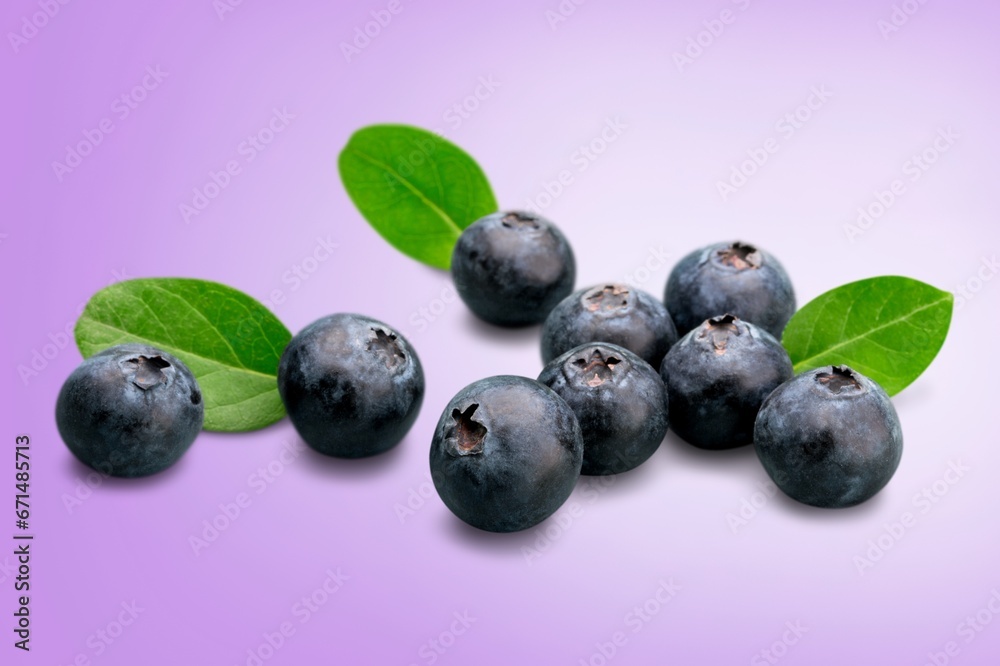 Tasty fresh ripe blueberries on the desk