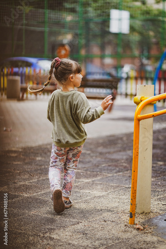 little child is playing on playground in varna bulgaria 