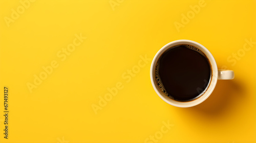 black coffee cup on yellow background photo
