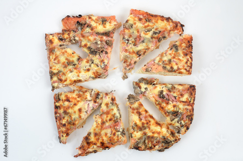 homemade juicy pizza on thick dough with lots of toppings photo on a white background