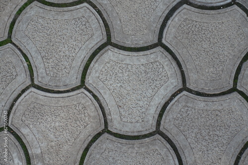 Macro of rounded gray concrete interlocking paver blocks photo