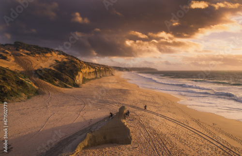 sunset on the beach at meco beach, Portugal photo