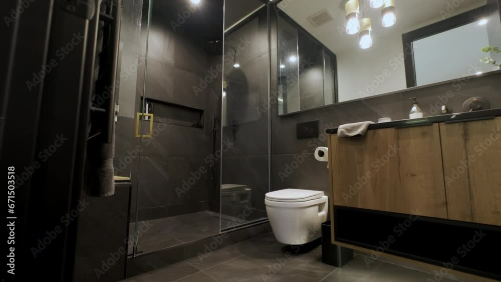 Elements of Modern Tiled Bathroom in modern home, real estate interior. Wide footage of interior 