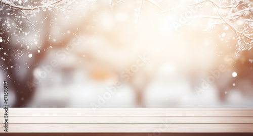 Side view of an empty white wooden table top with a gentle blurred soft light background. Bokeh effect. Christmas, holiday concept.