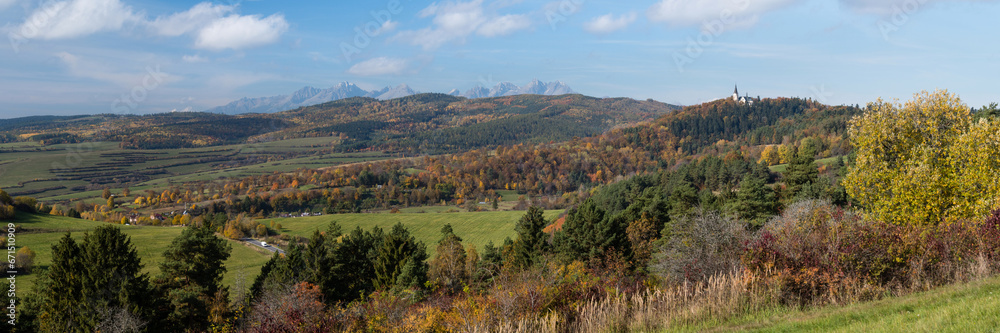 Basilica of the Visitation of the Virgin Mary on top of the Marianska hill with panorama of High Tatras in background, Slovakia