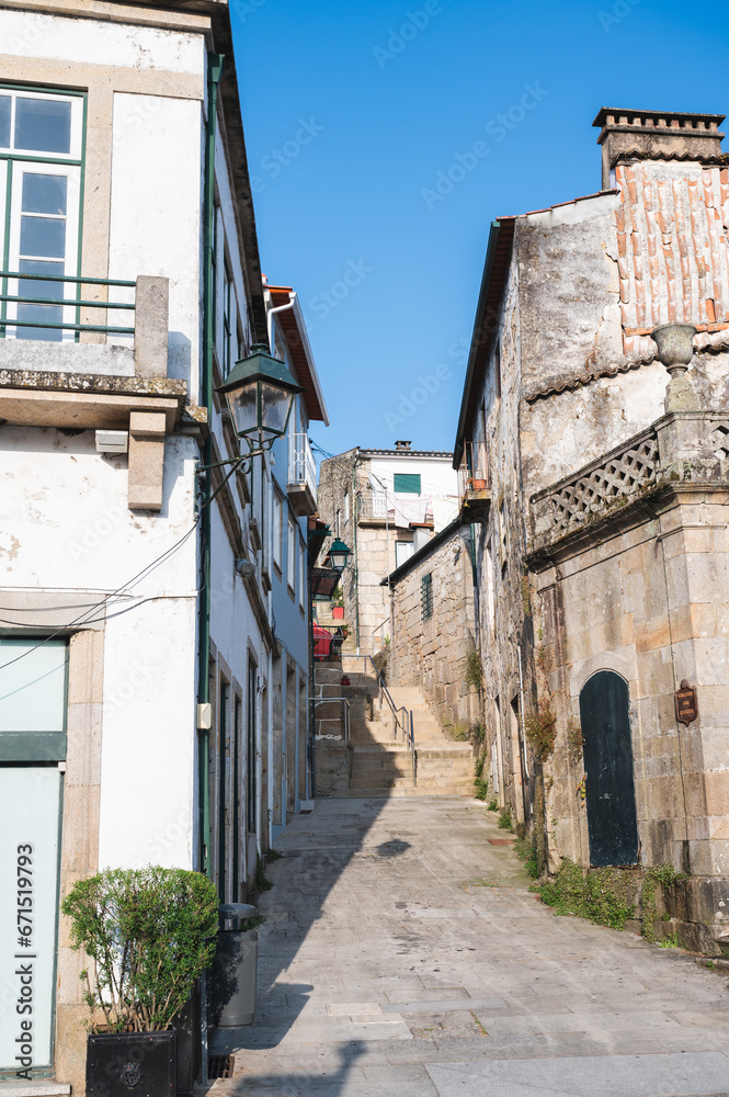 Fototapeta premium Old town Ponte de Lima, narrow streets and old houses. Part of the district of Viana do Castelo, selective focus