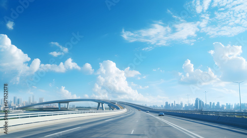 road through the bridge with blue sky background of a city. photo