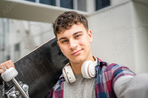 portrait of young Caucasian man teenager 18 or 19 years old outdoor photo