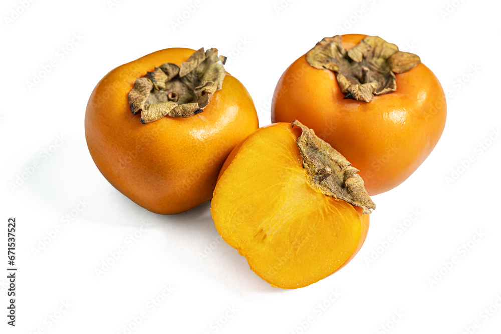 ripe juicy sweet persimmons isolated on white