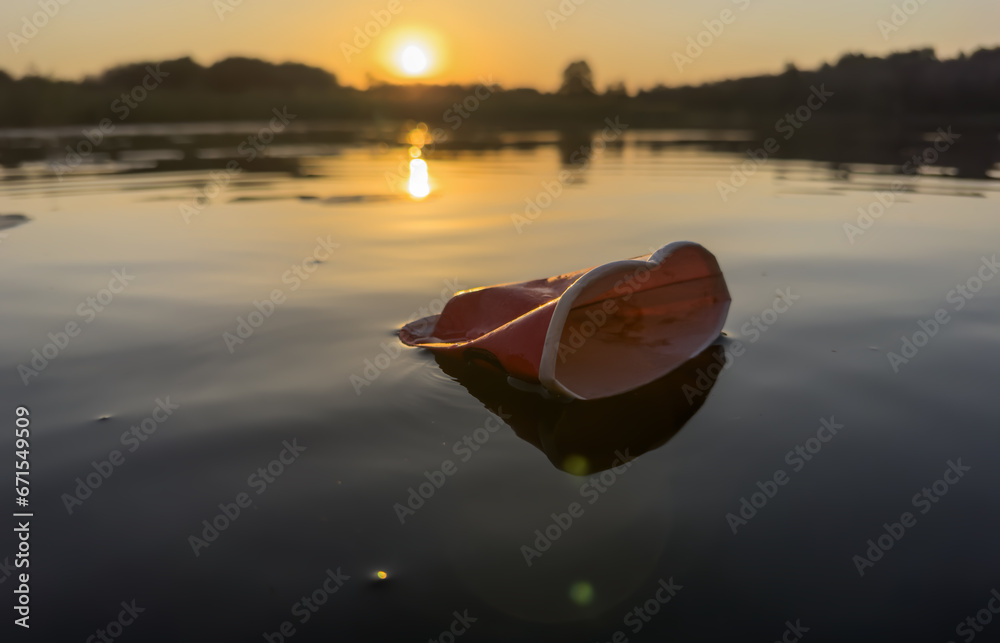 Water pollution. Coffee paper cup Garbage. Marine pollution. Aquatic ...