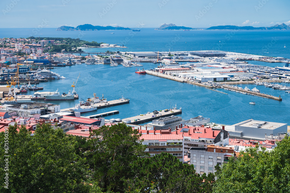 The view from the hill in Parque Monte del Castro, park located on a hill in Vigo, the biggest city in Galicia Region, in the North of Spain. View of the sea, harbour and docks, selective focus