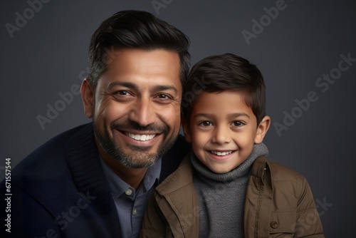 Portrait of happy loving father and son of Indian ethnicity.
