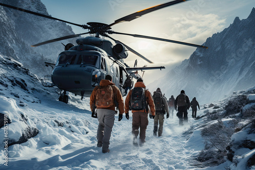 people climb snowy mountain road near rescue helicopter,