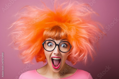 Crazy woman with electrified orange hair, big glasses, open mouth.