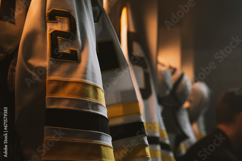 ECU View of ice hockey team uniform hanging in a changing room