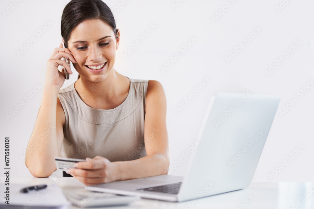 Business woman, credit card and phone call for banking, ecommerce and payment for online shopping, Laptop, smile or happy worker talking on smartphone for fintech info, service or investment advice Business woman, credit card and phone call for banking, ecommerce and payment for online shopping, Laptop, smile or happy worker talking on smartphone for fintech info, service or investment advice