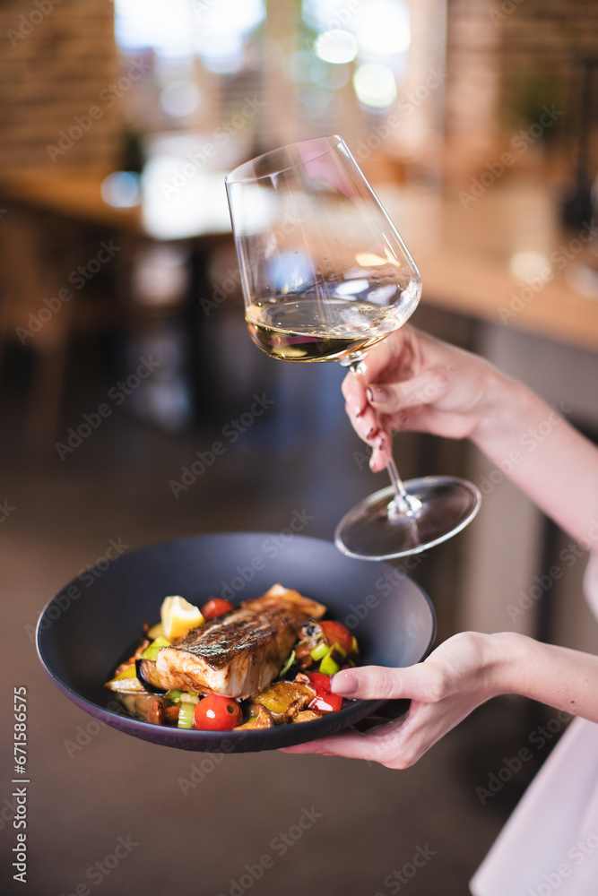 Appetizing fried piece of fish fillet on a colored background. Restaurant, banquet, buffet. Appetizing fried piece of fish fillet on a colored background. Restaurant, banquet, buffet.