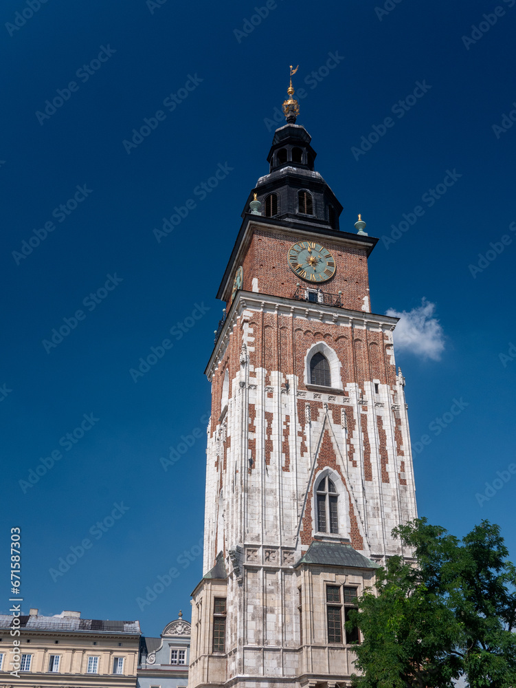 Fototapeta premium Restoration of 14th-century Town Hall Tower in the center of Kraków's center square.